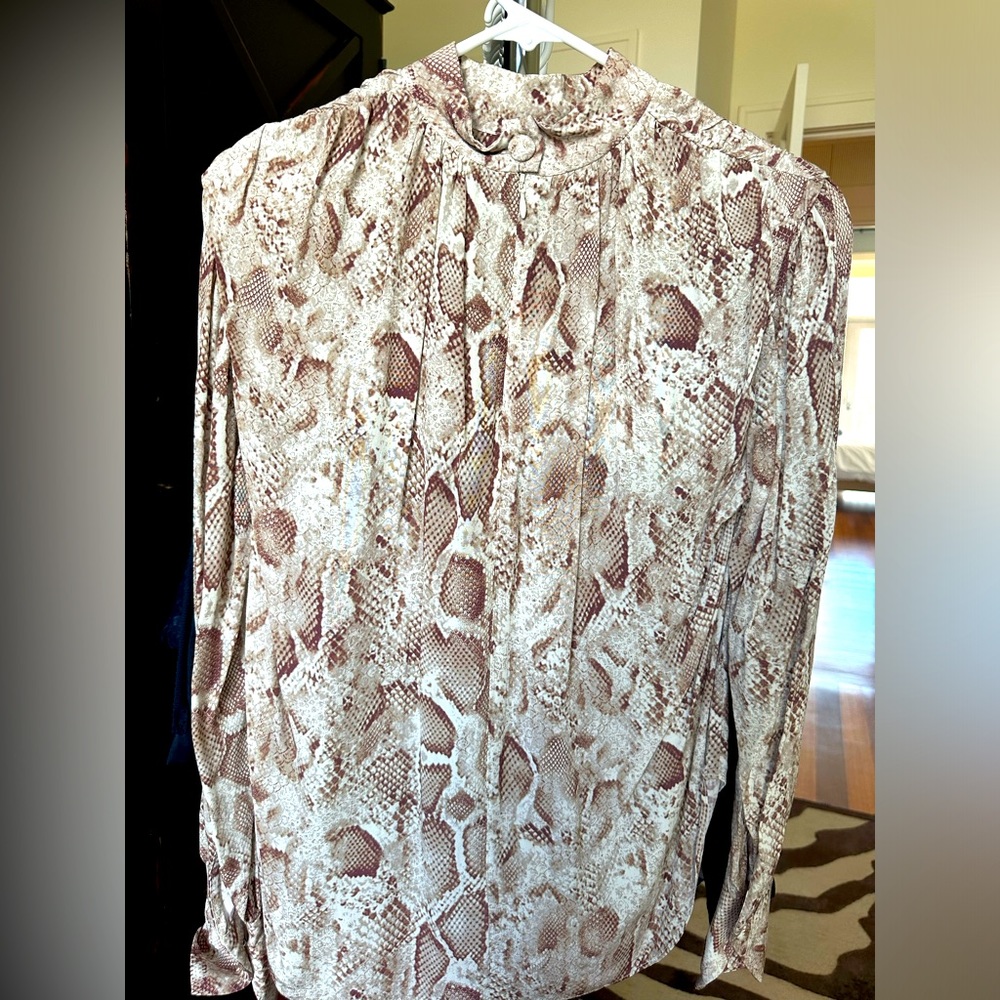Elegant, but with edge blouse.